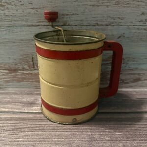 Vintage Androck flour sifter cream with red stripe